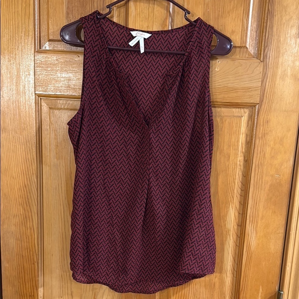 Candie’s top size medium.